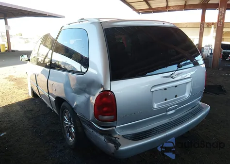 1999 Chrysler Town & Country Limited z USA, uszkodzony, nr VIN 1C4GP64L8XB916537